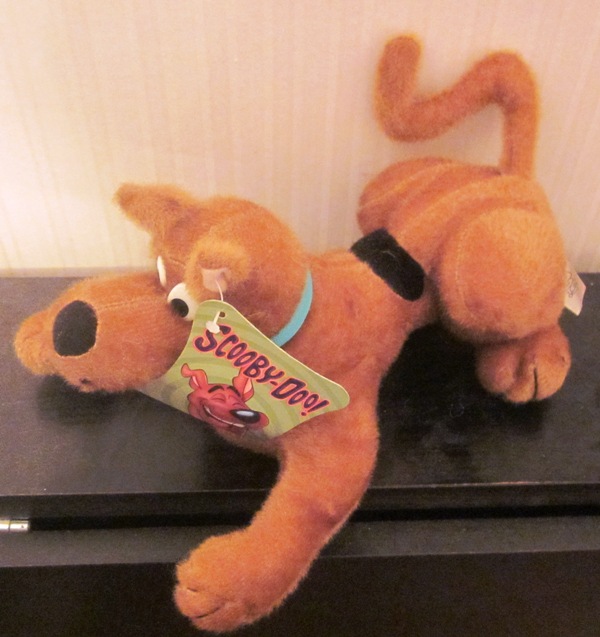 stuffed dog laying down